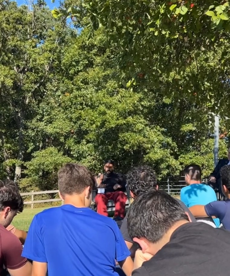 Outdoor mentorship circle with young men